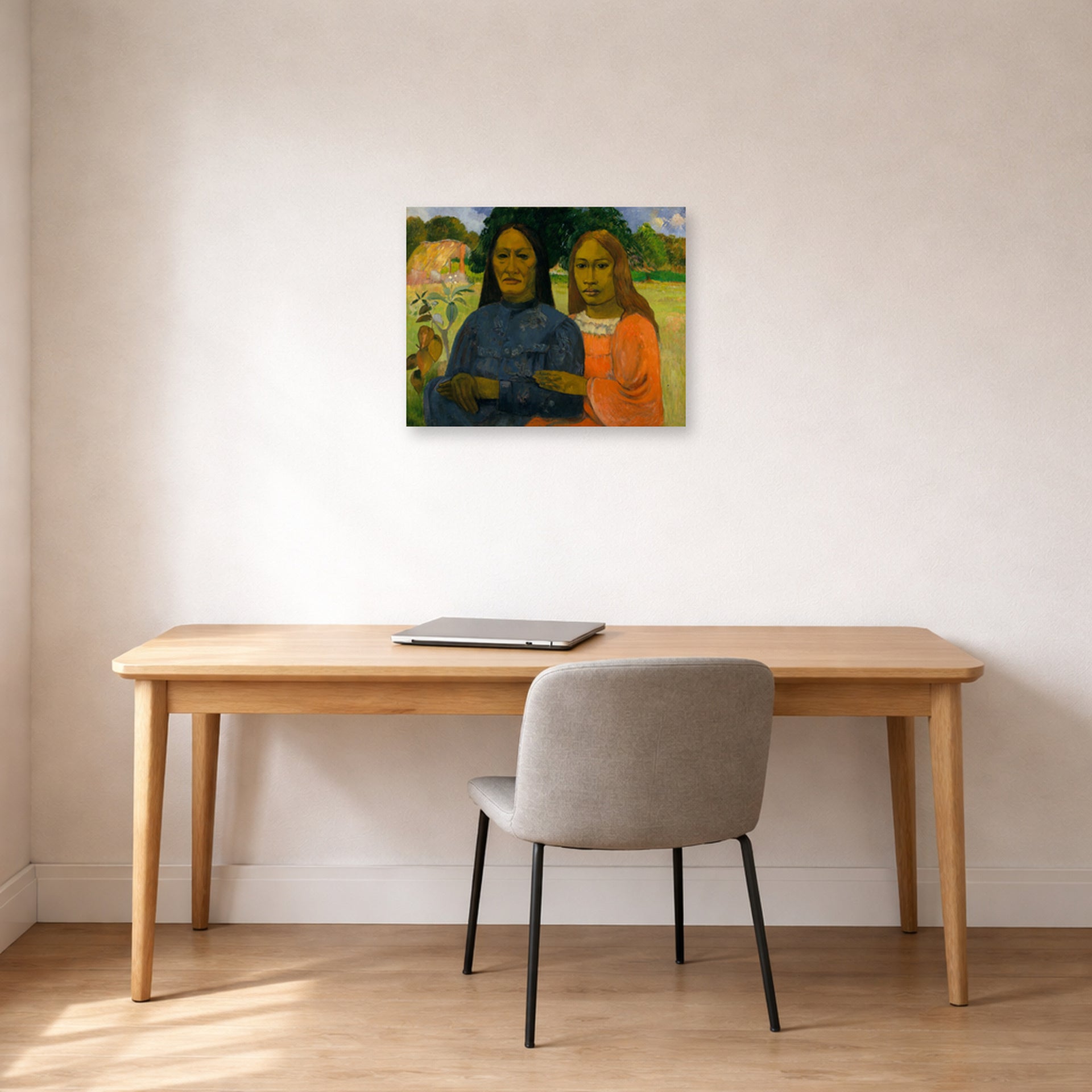 Unframed poster print of Paul Gauguin's Two Women displayed on a wall in an office