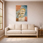 Unframed poster print of Paul Klee's Adam and Little Eve displayed on a wall in a living room