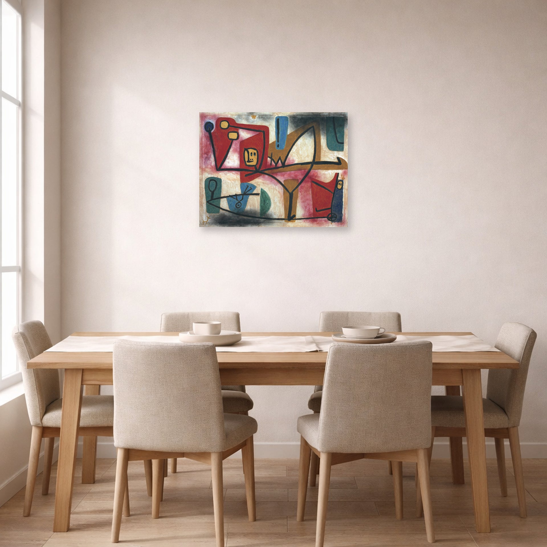 Unframed poster print of Paul Klee's Arrogance displayed on a wall in a dining room