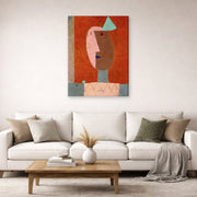 Gallery-wrapped canvas print of Paul Klee's Clown displayed on a wall in a living room