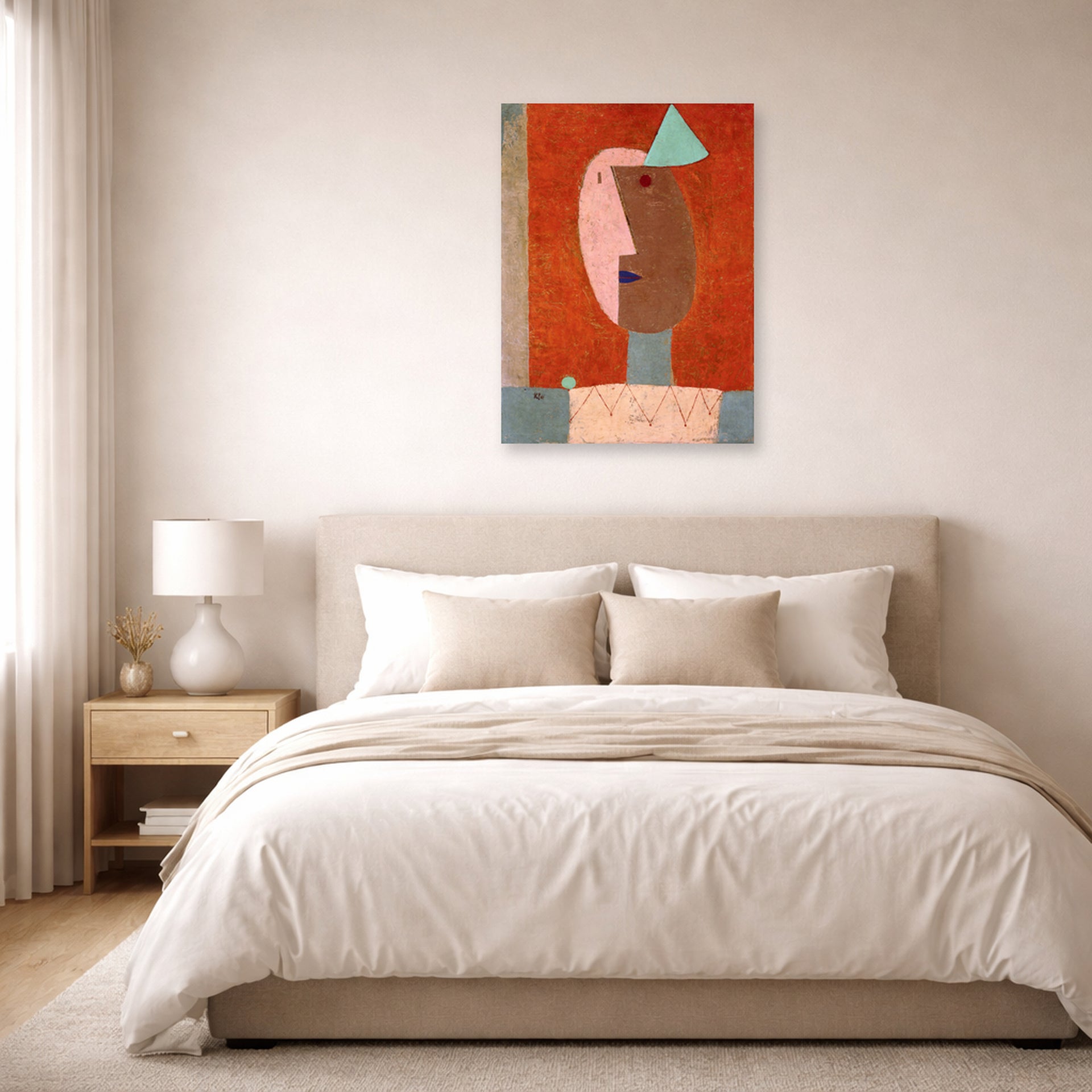Unframed poster print of Paul Klee's Clown displayed on a wall in a bedroom