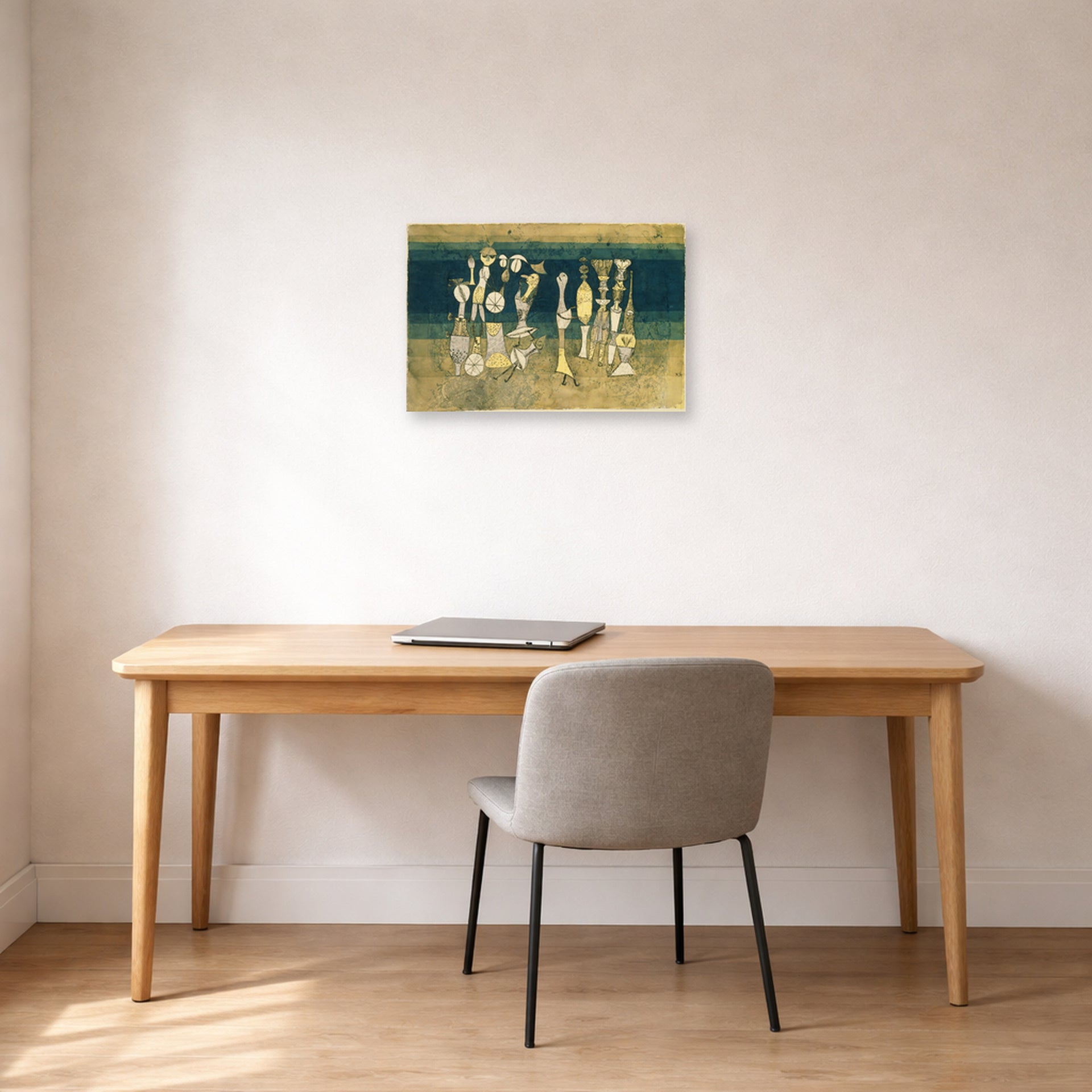 Unframed poster print of Paul Klee's Comedy displayed on a wall in an office