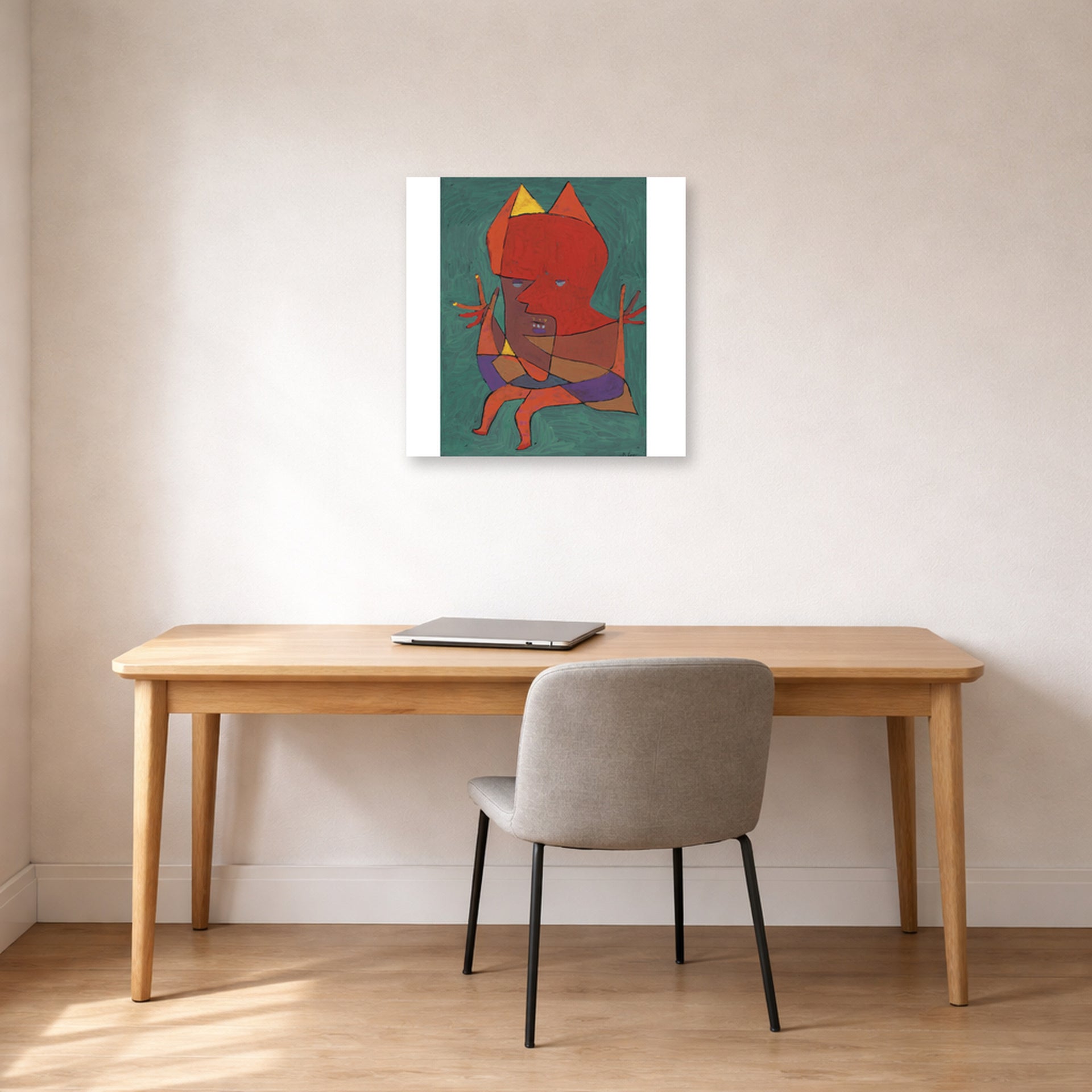 Unframed poster print of Paul Klee's Figurine Small Fire Devilfigurine Kleiner Furtufel displayed on a wall in an office