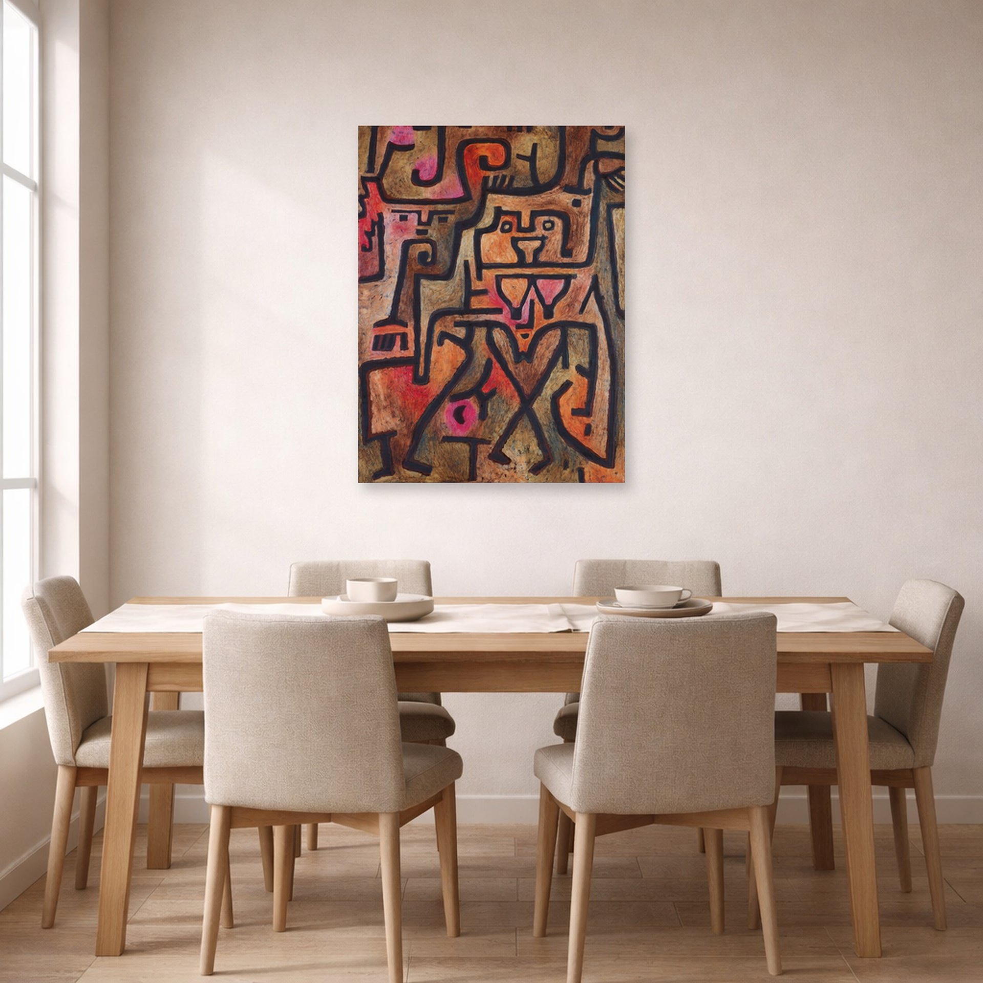 Unframed poster print of Paul Klee's Forest Witches displayed on a wall in a dining room