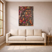 Unframed poster print of Paul Klee's Forest Witches displayed on a wall in a living room