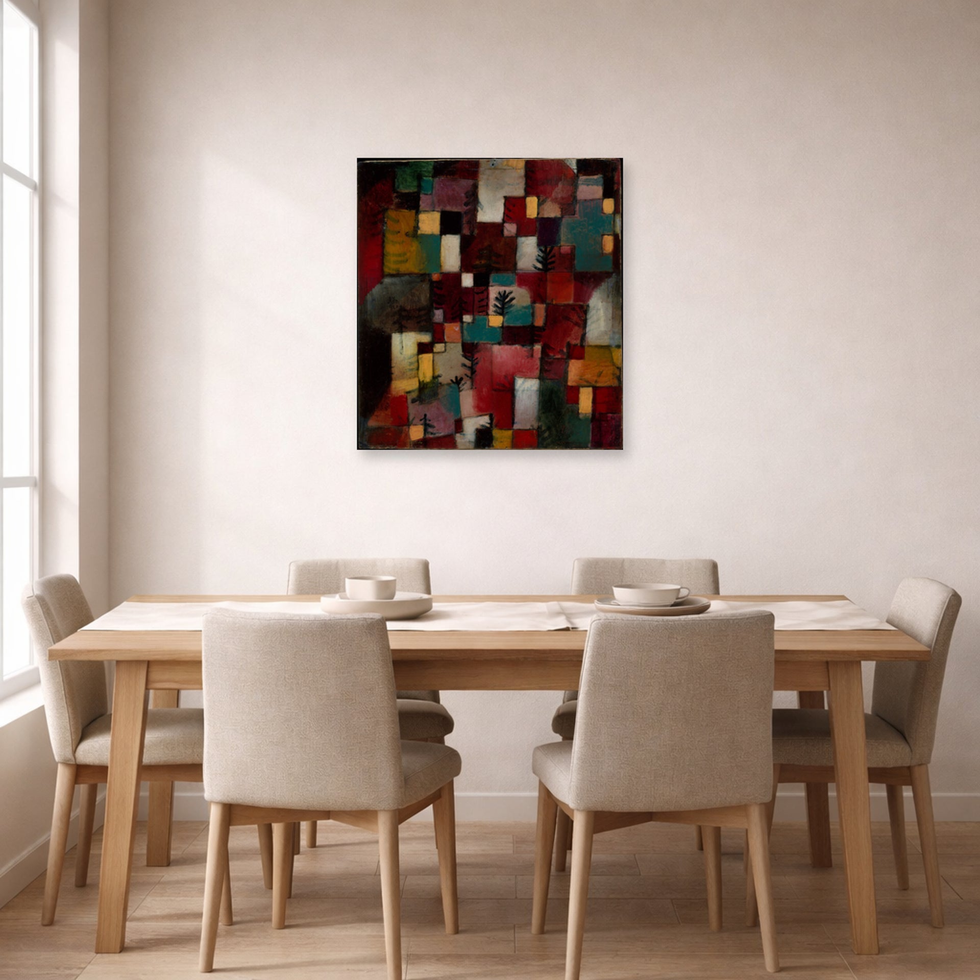 Unframed poster print of Paul Klee's Redgreen and Violet Yellow Rhythms displayed on a wall in a dining room