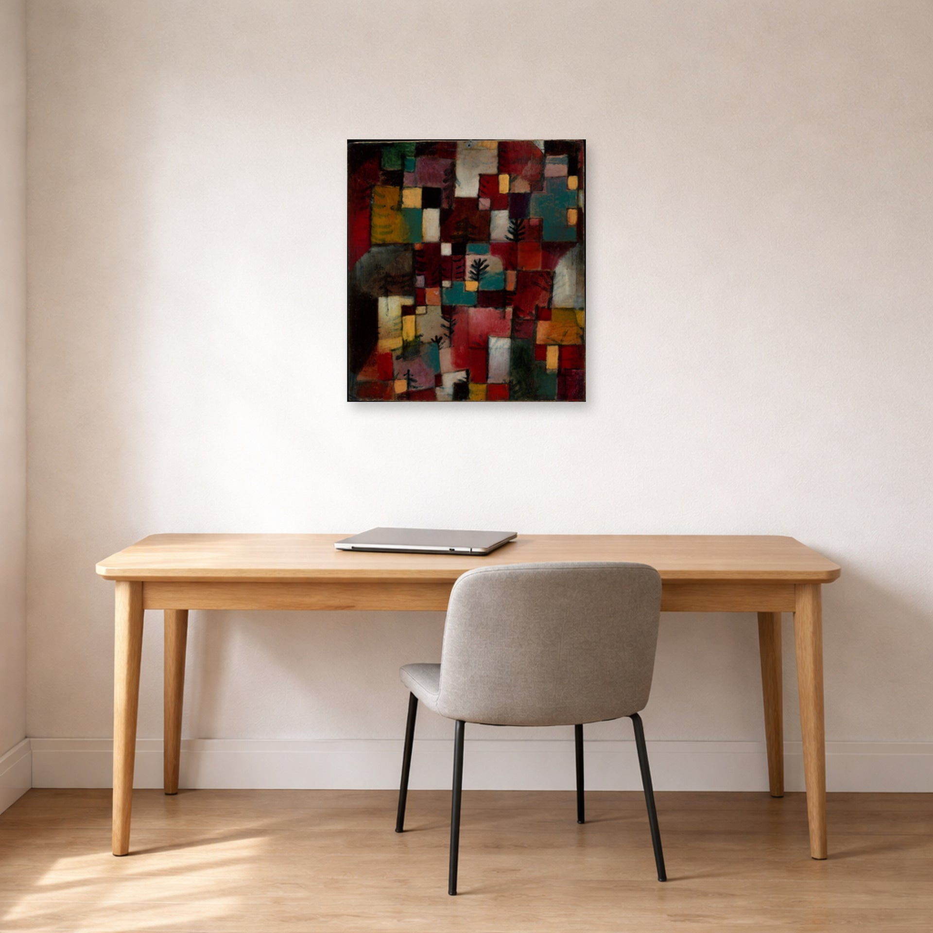 Unframed poster print of Paul Klee's Redgreen and Violet Yellow Rhythms displayed on a wall in an office