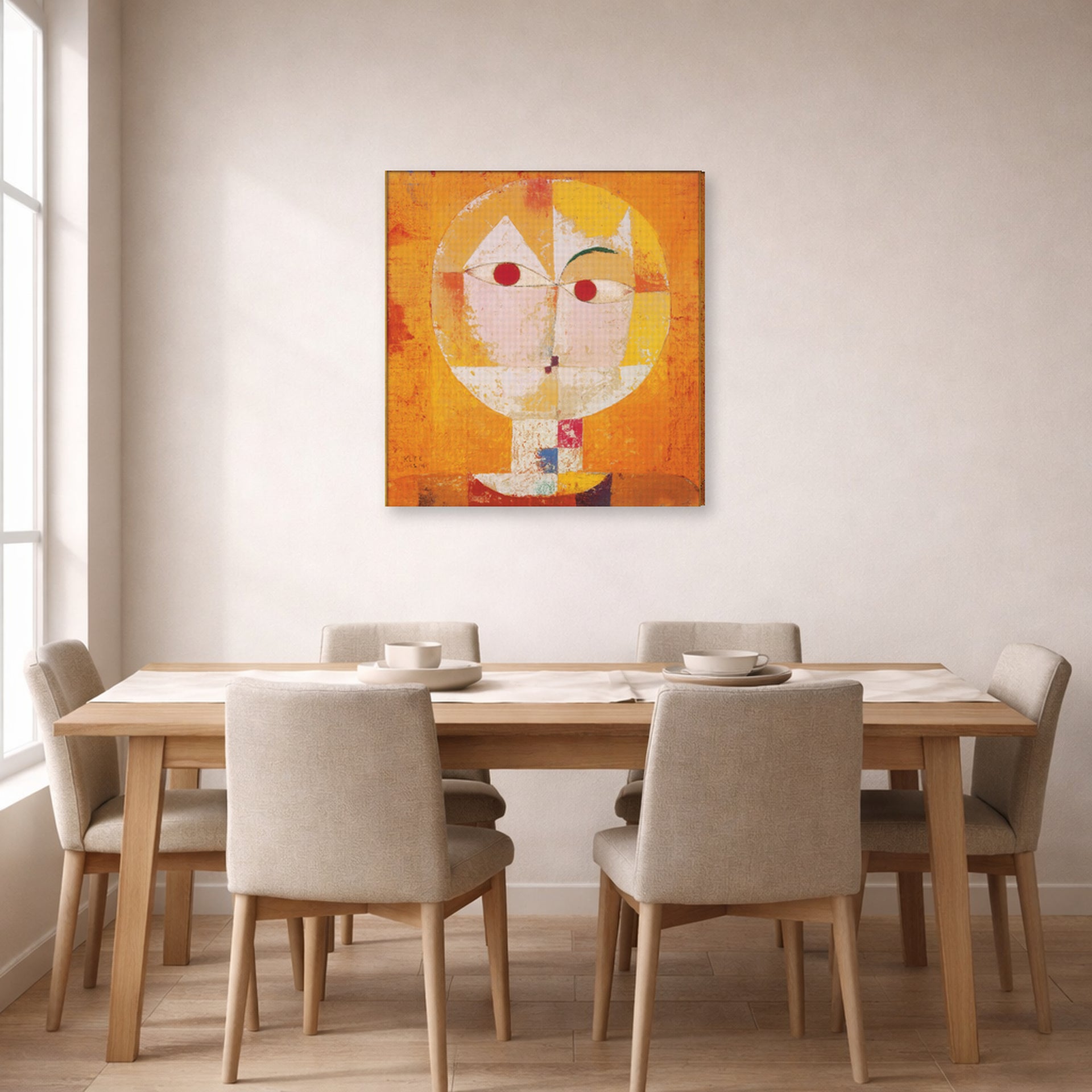 Gallery-wrapped canvas print of Paul Klee's Senecio displayed on a wall in a dining room