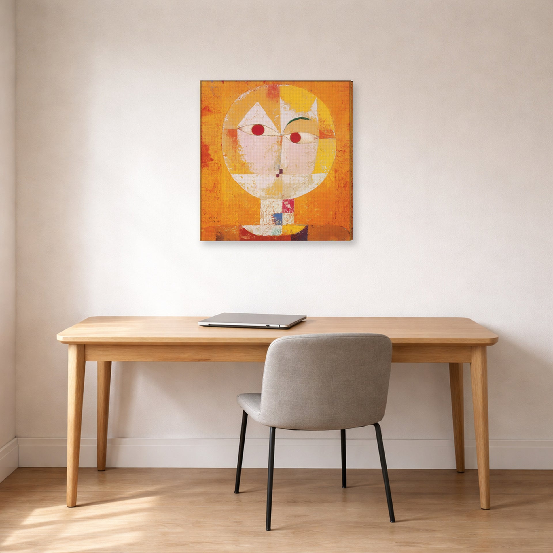 Gallery-wrapped canvas print of Paul Klee's Senecio displayed on a wall in an office