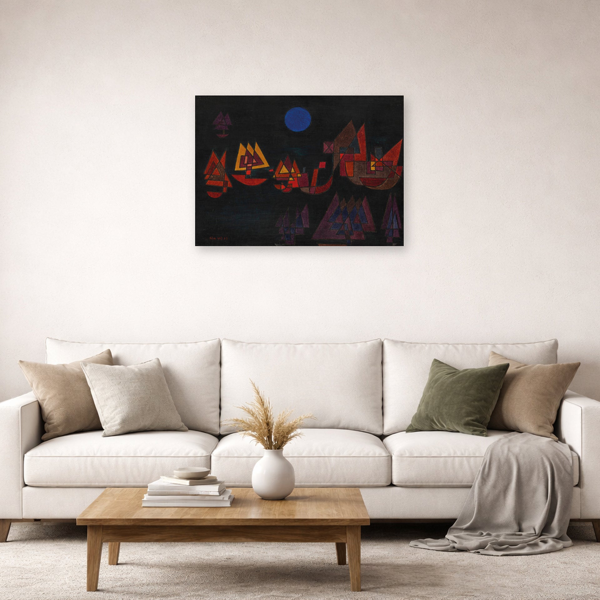 Unframed poster print of Paul Klee's Ships in the Dark displayed on a wall in a living room