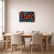 Gallery-wrapped canvas print of Paul Klee's The Hour Before One Night displayed on a wall in a dining room