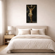 Gallery-wrapped canvas print of Peter Paul Rubens' 'Christ on the cross' displayed on a wall in a bedroom