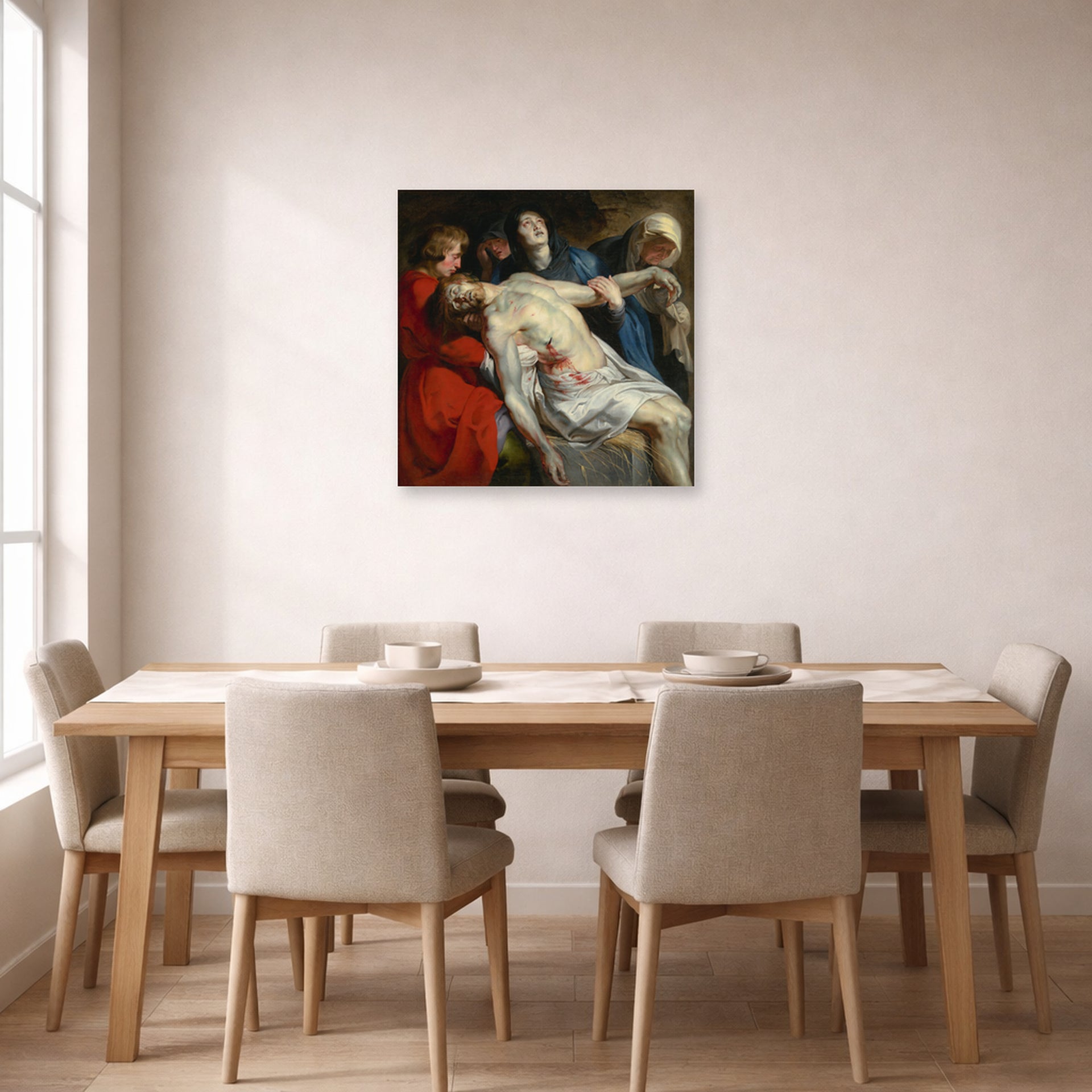 Unframed poster print of Peter Paul Rubens' 'Entombment' displayed on a wall in a dining room