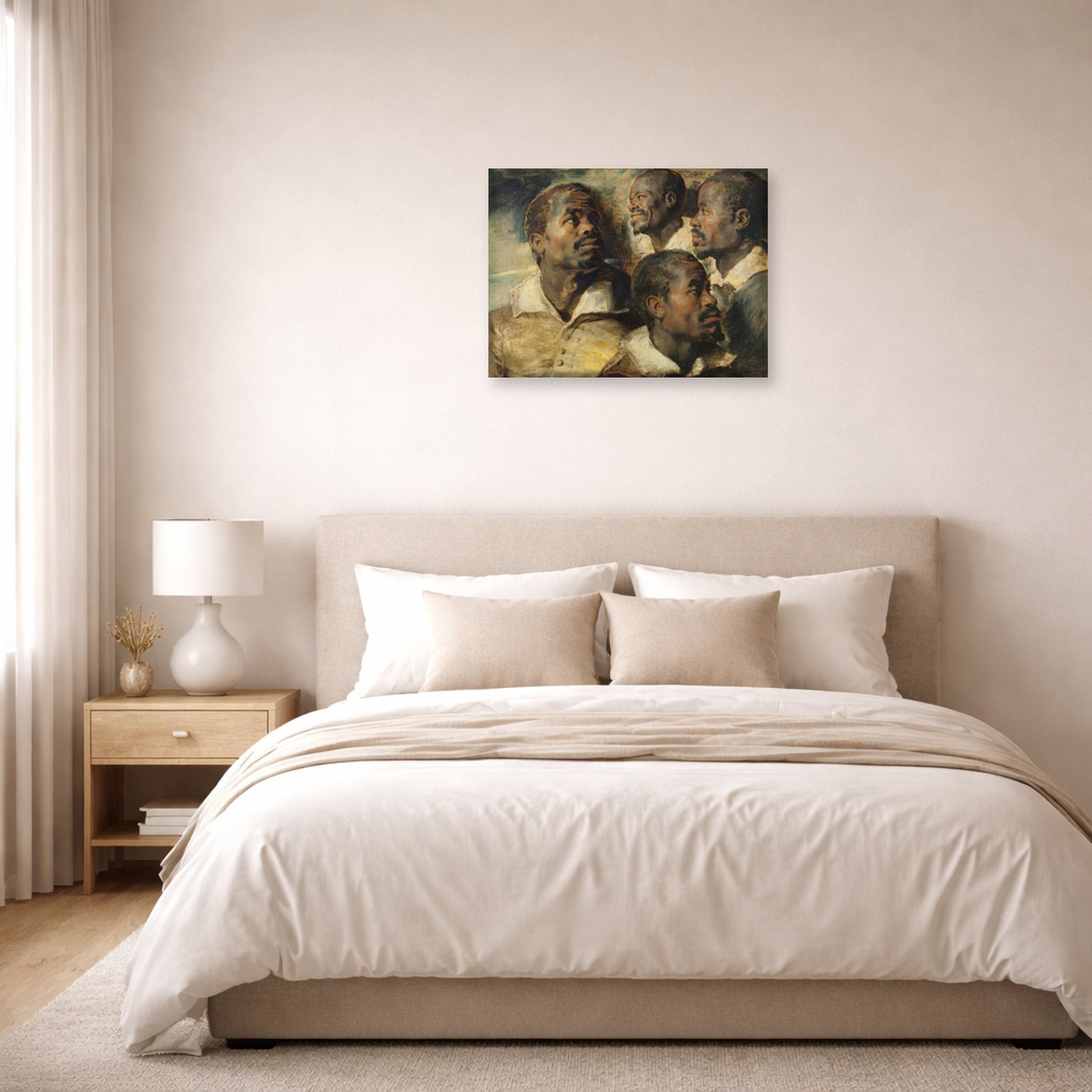 Unframed poster print of Peter Paul Rubens' 'Four Studies of the head of a Moore' displayed on a wall in a bedroom