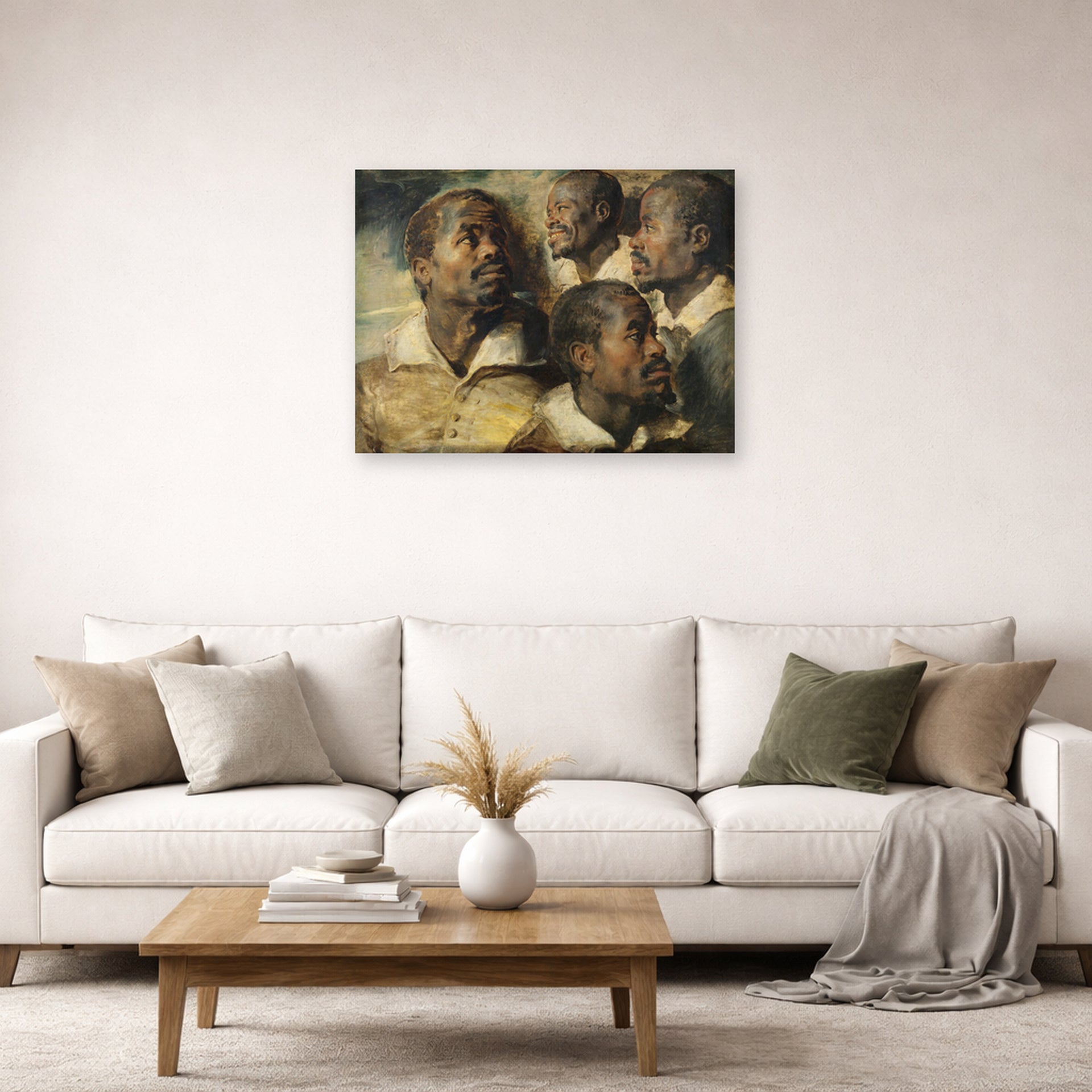 Unframed poster print of Peter Paul Rubens' 'Four Studies of the head of a Moore' displayed on a wall in a living room (image 2 of 2)
