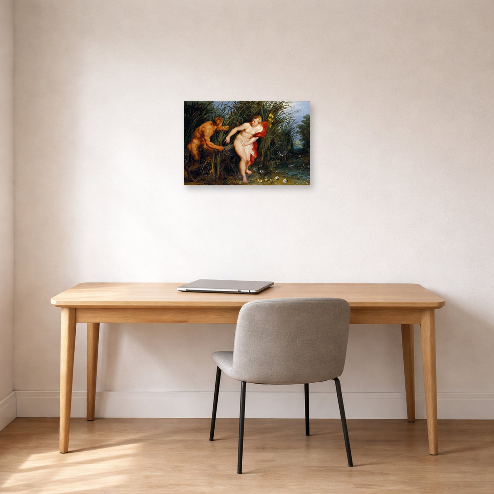 Unframed poster print of Peter Paul Rubens' 'Pan and Syrinx' displayed on a wall in an office