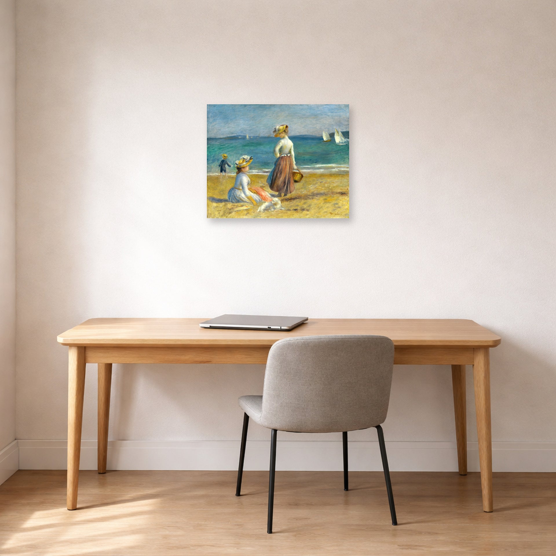 Unframed poster print of Pierre-Auguste Renoir's Figures on the Beach displayed on a wall in an office