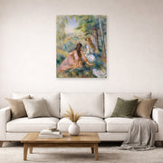 Unframed poster print of Pierre-Auguste Renoir's In the Meadow displayed on a wall in a living room