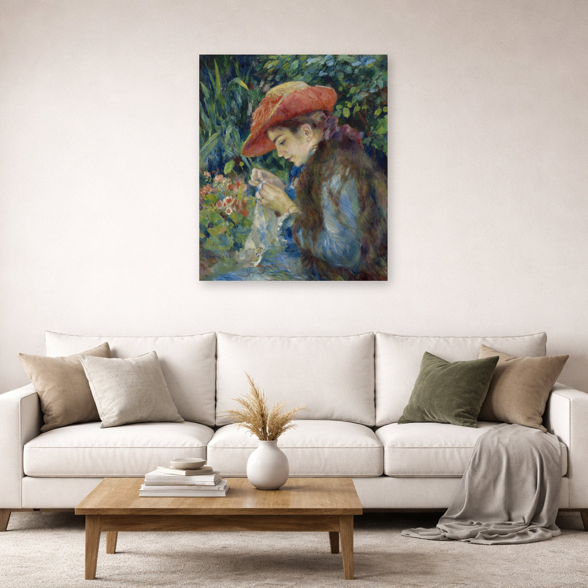 Unframed poster print of Pierre-Auguste Renoir's Marie Thérèse Durand Ruel Sewing displayed on a wall in a living room