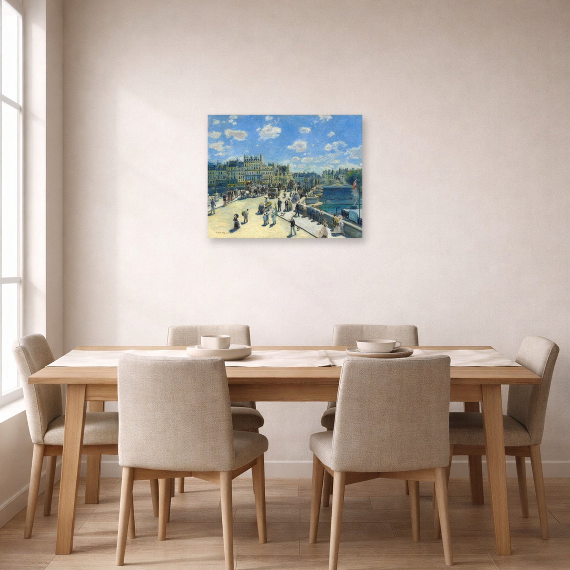 Unframed poster print of Pierre-Auguste Renoir's Pont Neuf displayed on a wall in a dining room