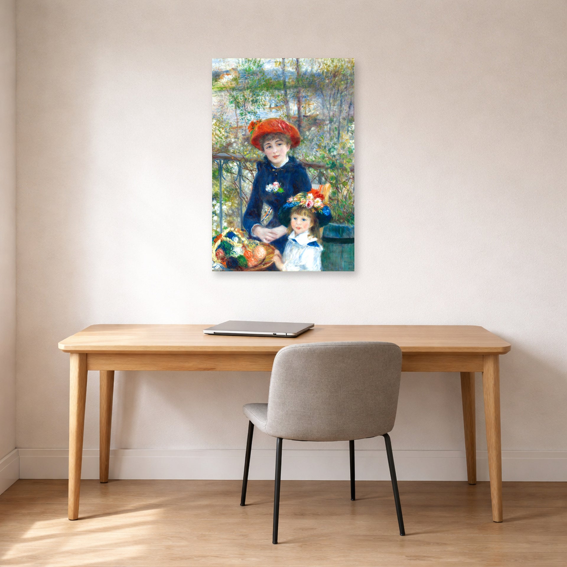 Unframed poster print of Pierre-Auguste Renoir's Two Sisters displayed on a wall in an office