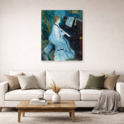 Gallery-wrapped canvas print of Pierre-Auguste Renoir's Woman at the Piano displayed on a wall in a living room