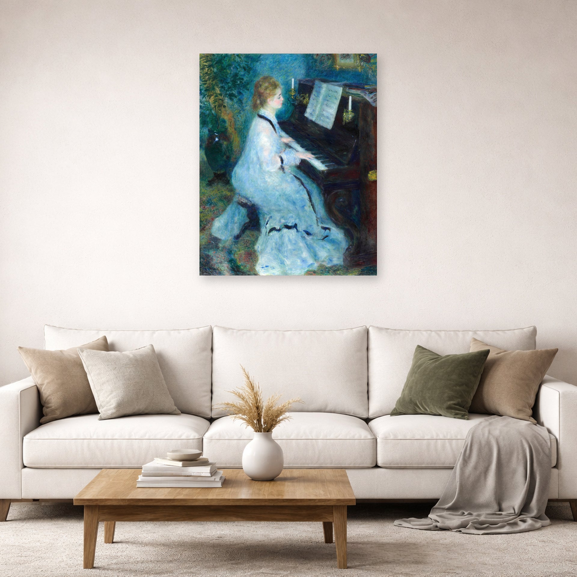 Unframed poster print of Pierre-Auguste Renoir's Woman at the Piano displayed on a wall in a living room