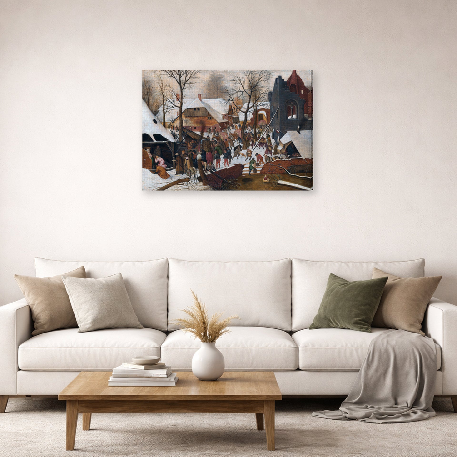Gallery-wrapped canvas print of Pieter Bruegel the Elder's Adoration of the Kings in the Snow displayed on a wall in a living room