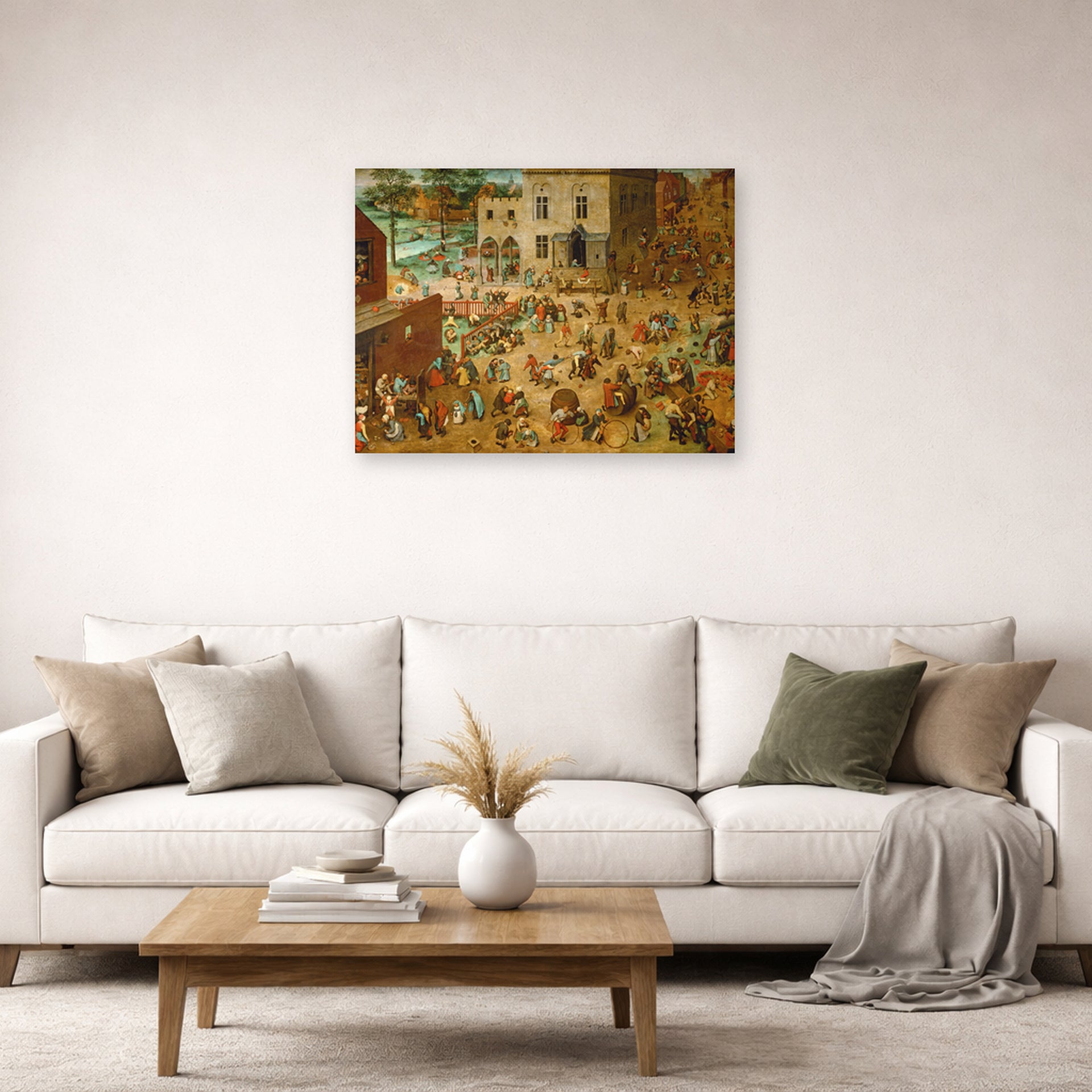 Unframed poster print of Pieter Bruegel the Elder's Children’s Games displayed on a wall in a living room