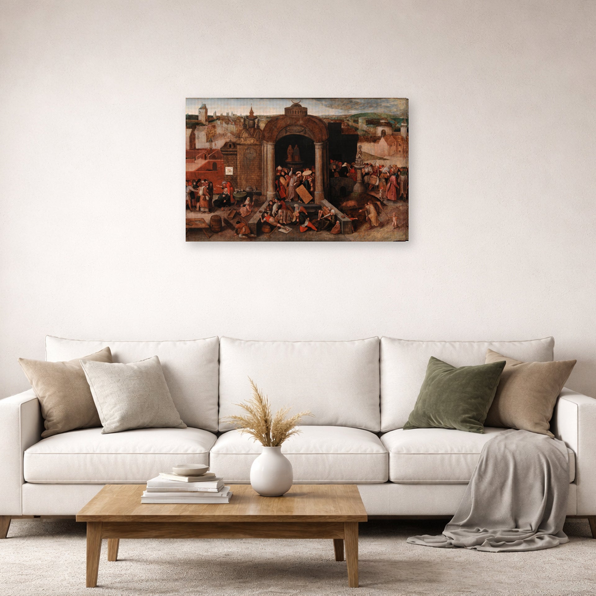 Gallery-wrapped canvas print of Pieter Bruegel the Elder's Christ Driving the Traders from the Temple displayed on a wall in a living room