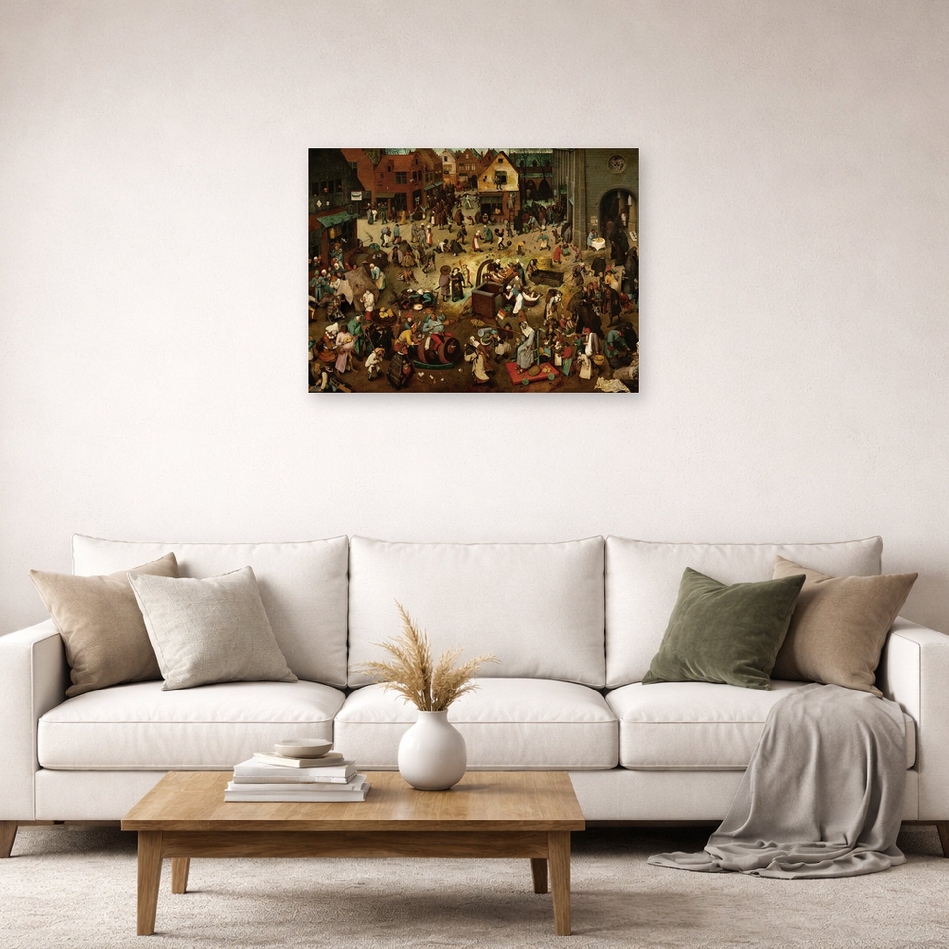 Unframed poster print of Pieter Bruegel the Elder's The Fight Between Carnival and Lent displayed on a wall in a living room