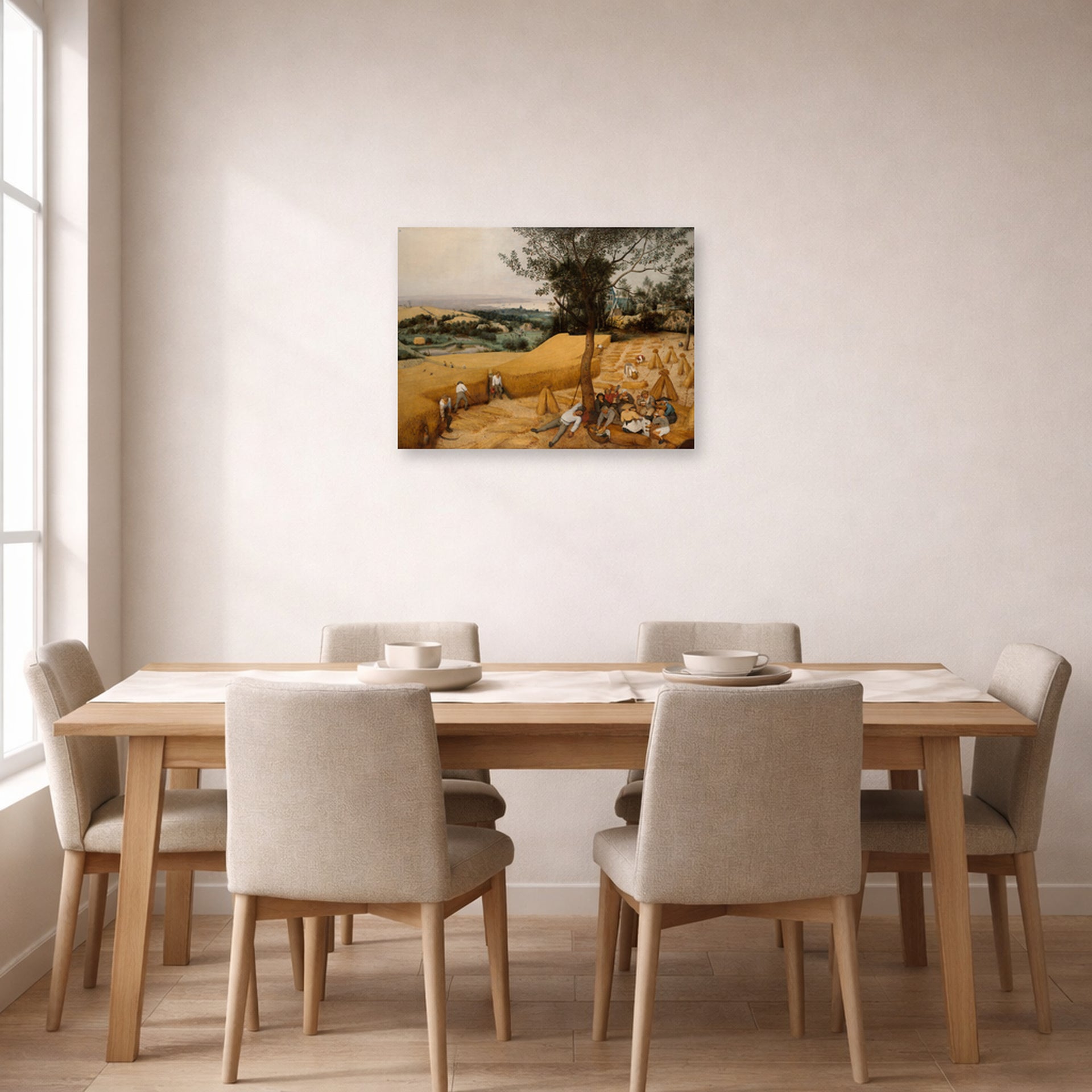Unframed poster print of Pieter Bruegel the Elder's The Harvesters displayed on a wall in a dining room