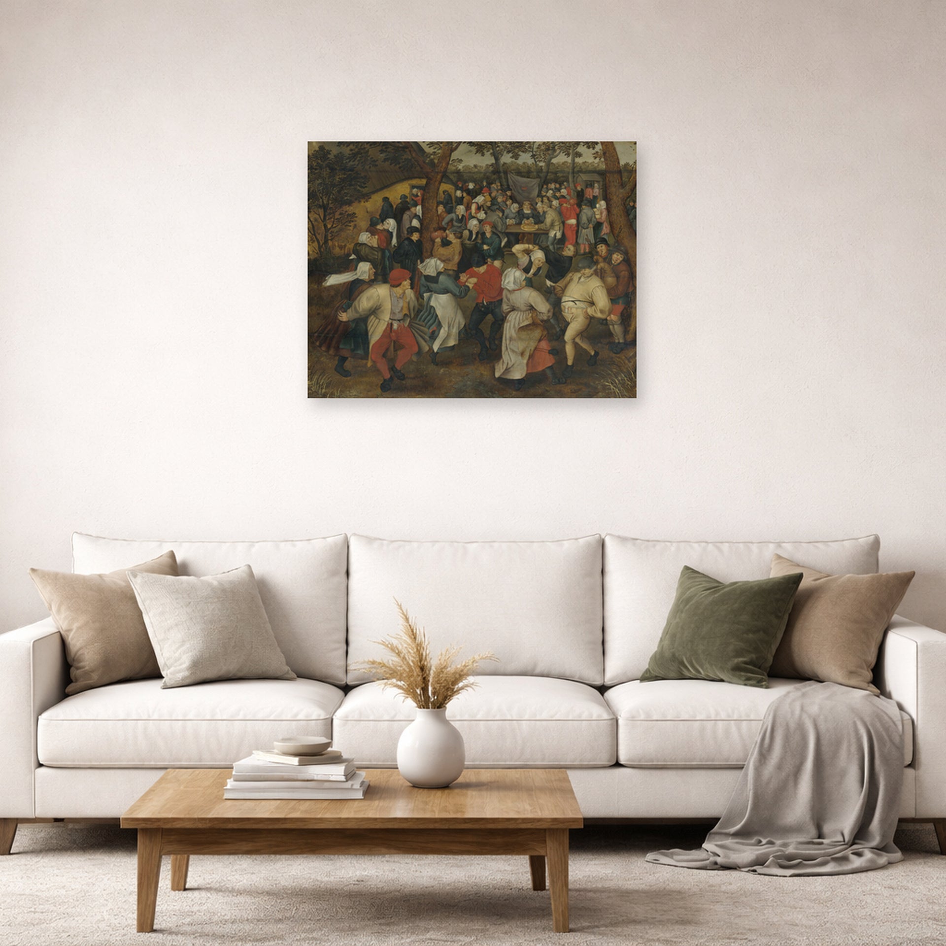 Unframed poster print of Pieter Bruegel the Elder's The Outdoor Wedding Feast displayed on a wall in a living room