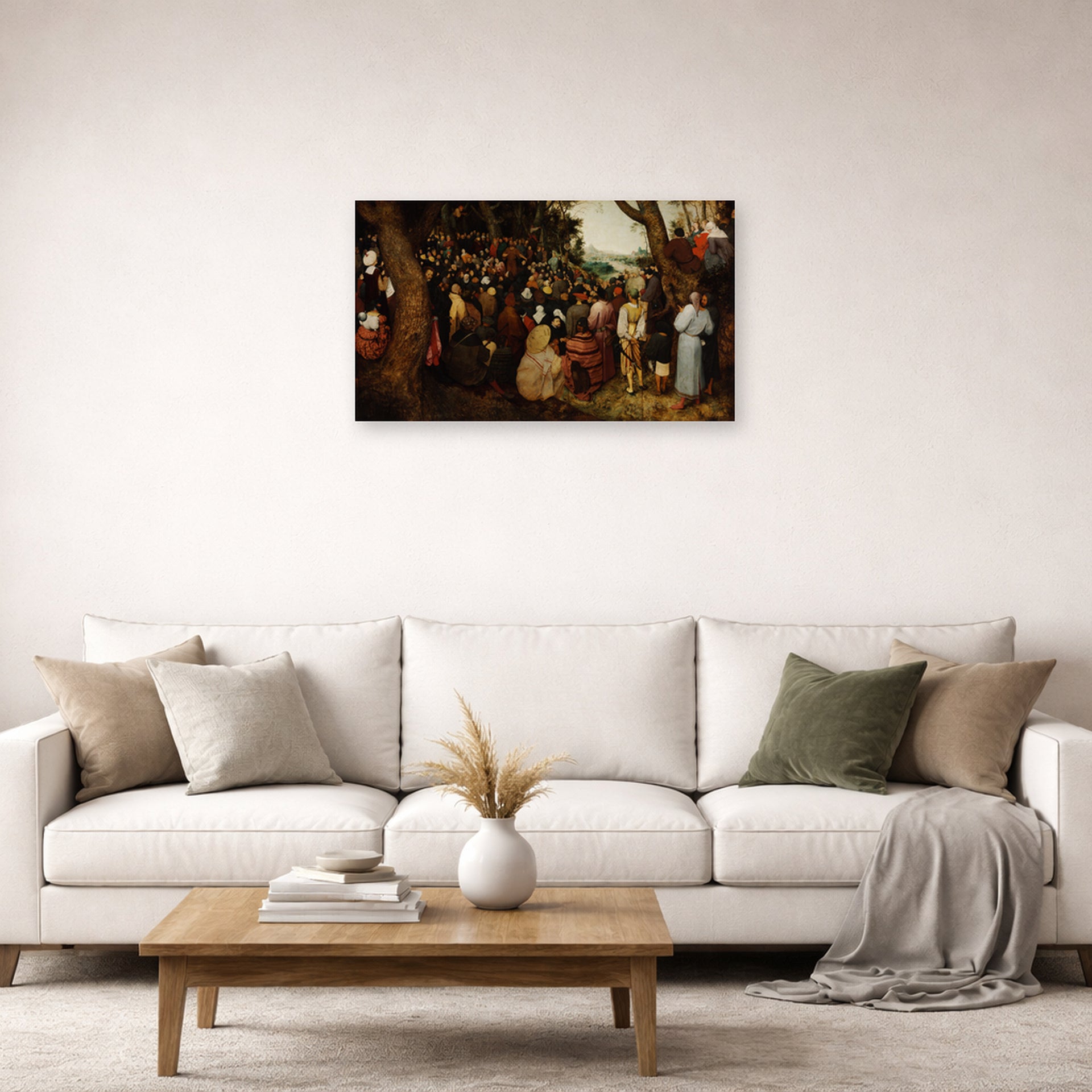 Unframed poster print of Pieter Bruegel the Elder's The Sermon of Saint John the Baptist displayed on a wall in a living room