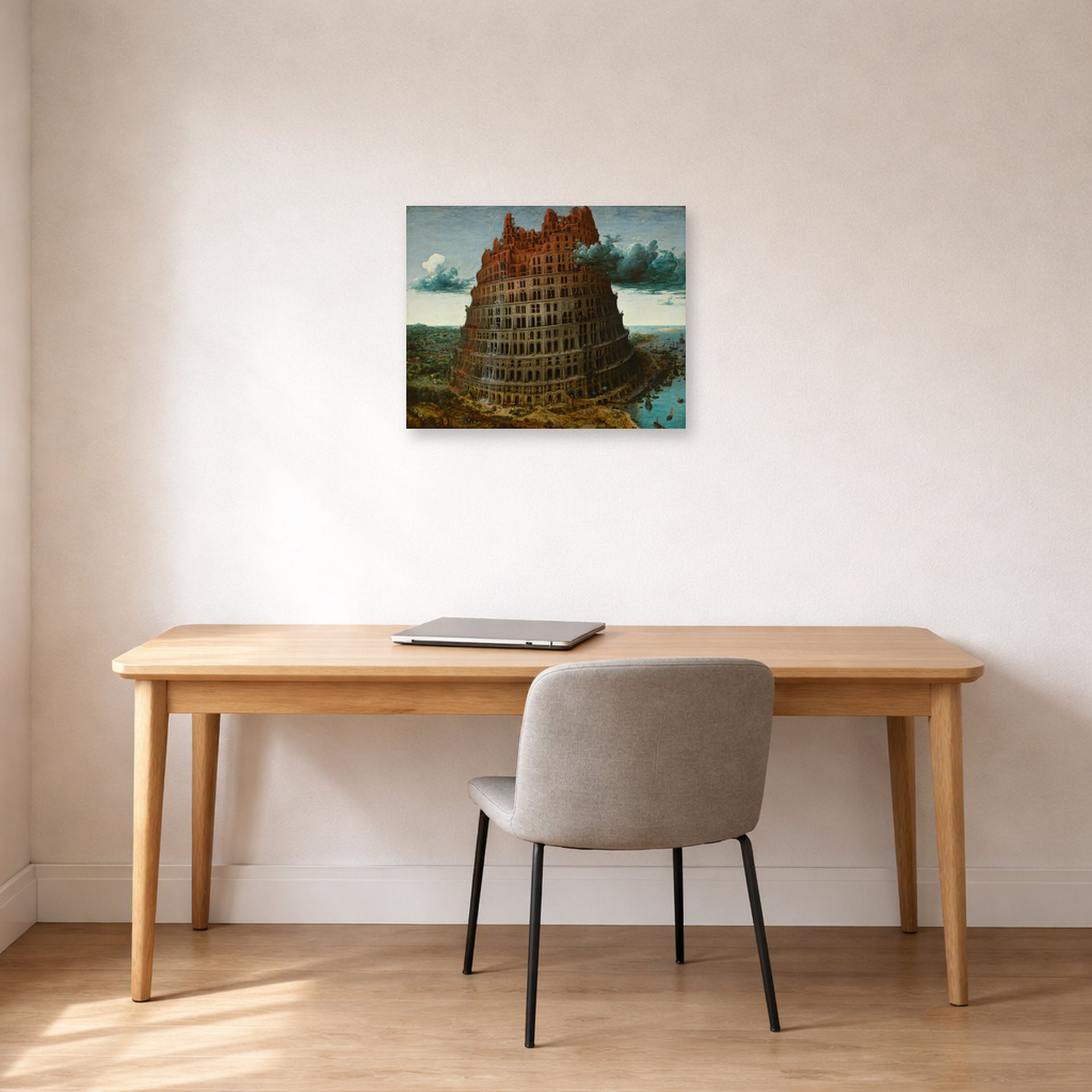 Unframed poster print of Pieter Bruegel the Elder's The Tower of Babel (Rotterdam) displayed on a wall in a home office