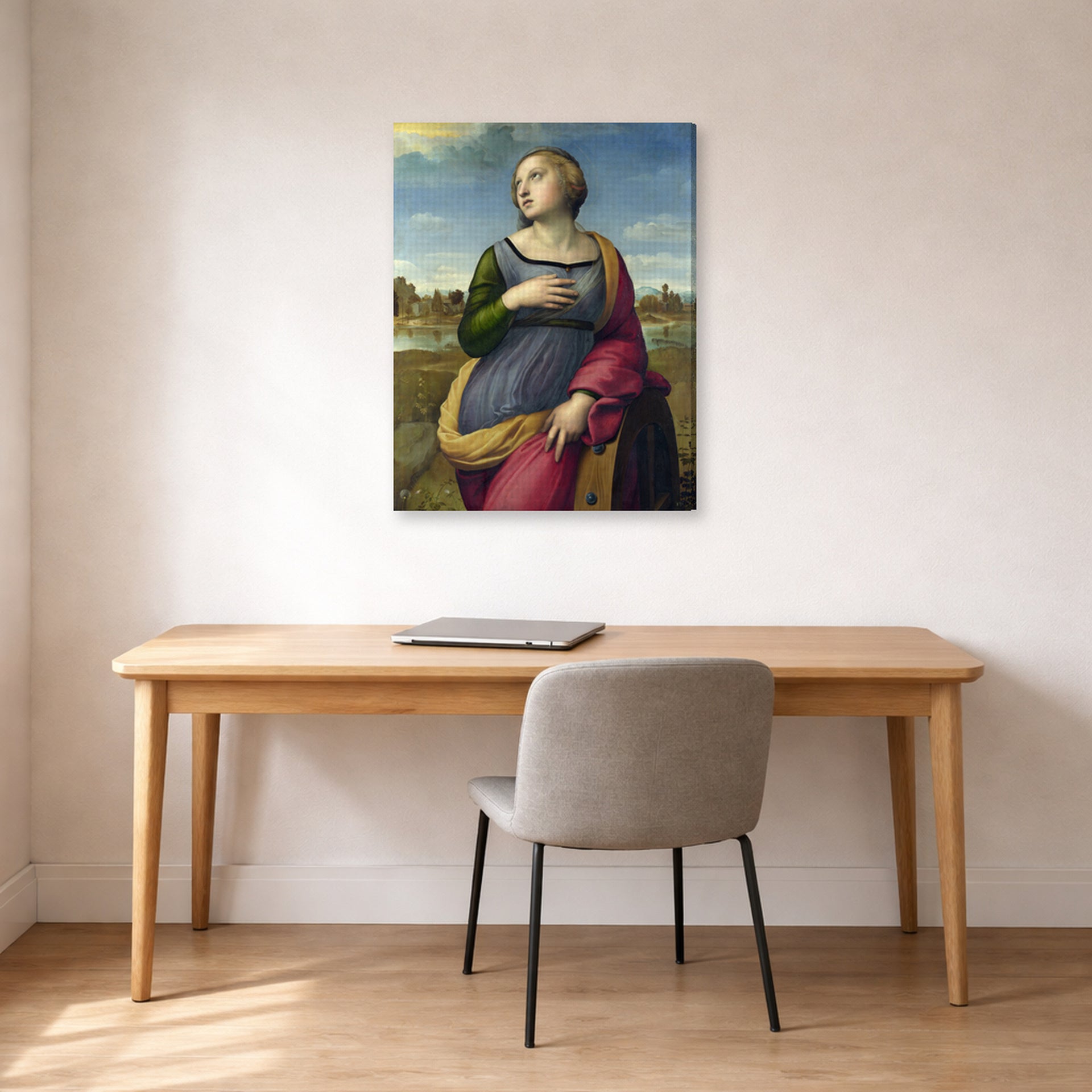 Gallery-wrapped canvas print of Raphael's Catherine displayed on a wall in a office