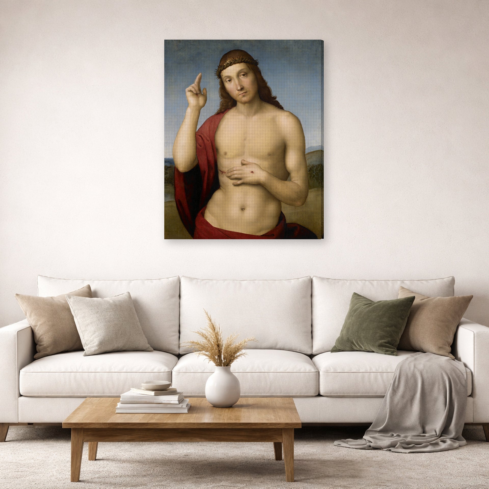 Gallery-wrapped canvas print of Raphael's Christ Blessing displayed on a wall in a living room