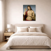 Unframed poster print of Raphael's Christ Blessing displayed on a wall in a bedroom