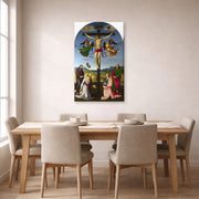 Gallery-wrapped canvas print of Raphael's Crucifixion with the Virgin, Saints and Angels displayed on a wall in a dining