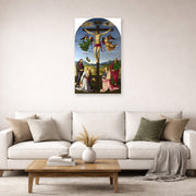 Unframed poster print of Raphael's Crucifixion with the Virgin, Saints and Angels displayed on a wall in a living room