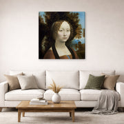 Gallery-wrapped canvas print of Raphael's Ginevra De Benci displayed on a wall in a living room
