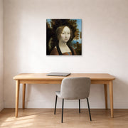 Gallery-wrapped canvas print of Raphael's Ginevra De Benci displayed on a wall in a office