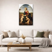 Gallery-wrapped canvas print of Raphael's La belle jardinière displayed on a wall in a living room