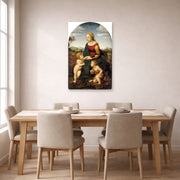 Unframed poster print of Raphael's La belle jardinière displayed on a wall in a dining