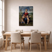 Unframed poster print of Raphael's Madonna del cardellino displayed on a wall in a dining