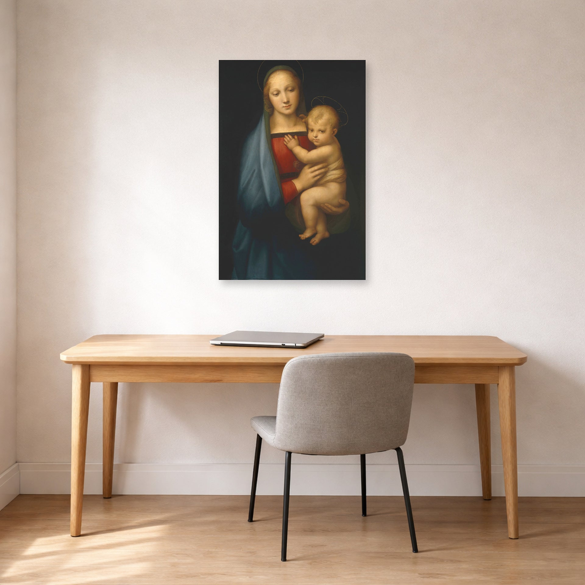 Unframed poster print of Raphael's Madonna del Granduca displayed on a wall in a office