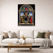 Gallery-wrapped canvas print of Raphael's Madonna and Child Enthroned with Saints displayed on a wall in a living room