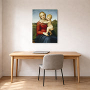 Gallery-wrapped canvas print of Raphael's Small Cowper Madonna displayed on a wall in a office