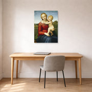 Unframed poster print of Raphael's Small Cowper Madonna displayed on a wall in a office