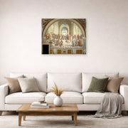 Unframed poster print of Raphael's The School of Athens displayed on a wall in a living room